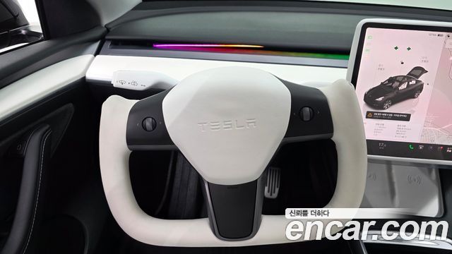 Tesla Model Y 2024 — photo 22