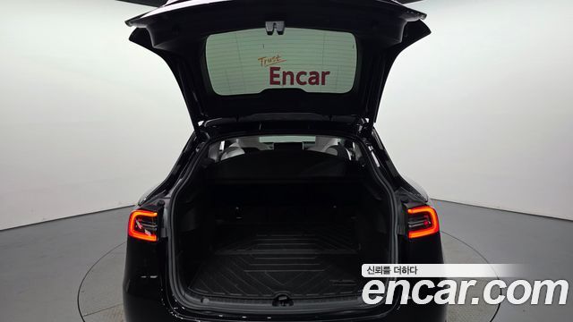 Tesla Model Y 2024 — photo 26