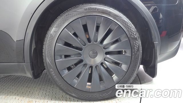Tesla Model Y 2024 — photo 7