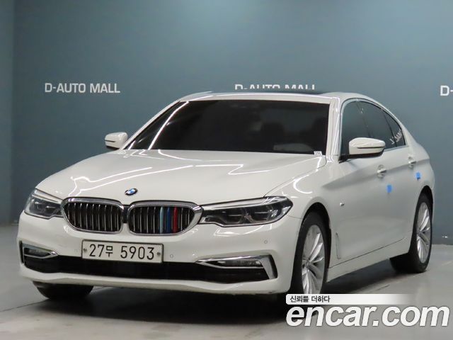 BMW 5-Series 2018 — photo 1