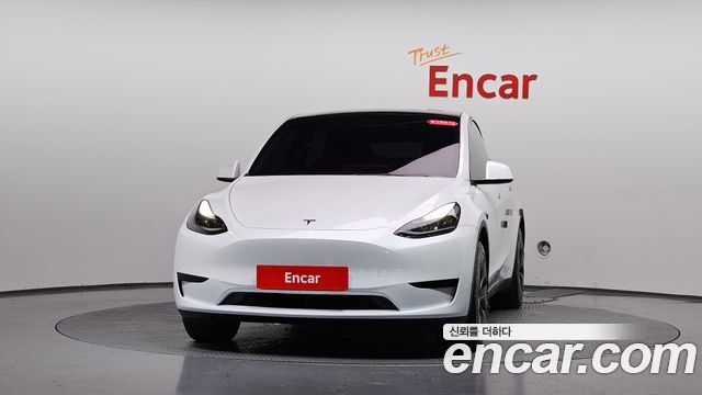 Tesla Model Y 2024 — photo 3