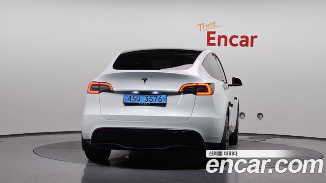 Tesla Model Y 2024 — photo 4