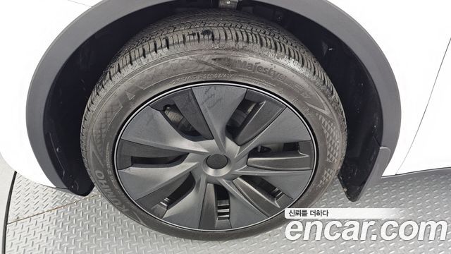 Tesla Model Y 2024 — photo 5