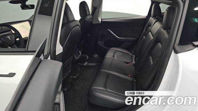 Tesla Model Y 2024 — photo 17