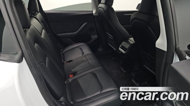 Tesla Model Y 2024 — photo 18