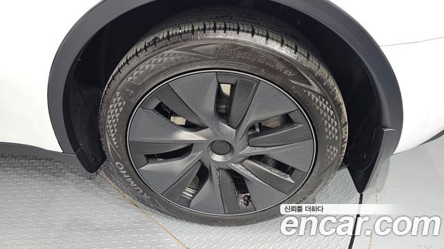 Tesla Model Y 2024 — photo 7