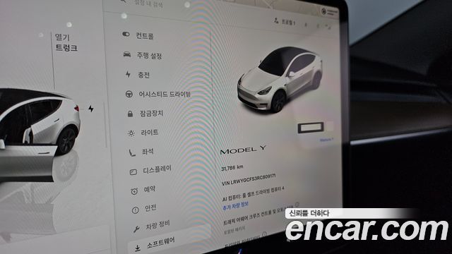 Tesla Model Y 2024 — photo 28