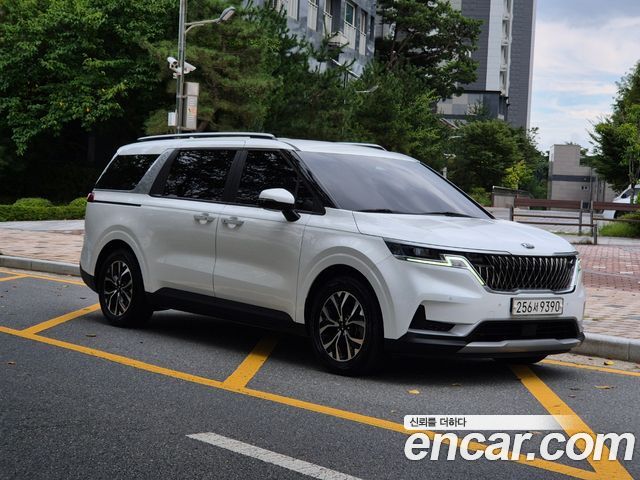 Kia Canival 2021 — photo 2
