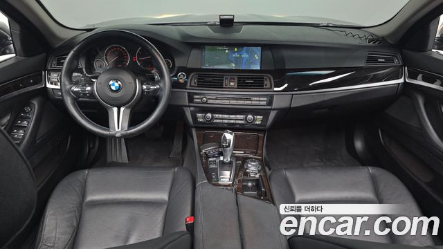 BMW 5-Series 2012 — photo 10
