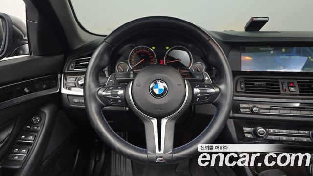 BMW 5-Series 2012 — photo 19