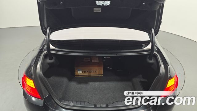 BMW 5-Series 2012 — photo 26