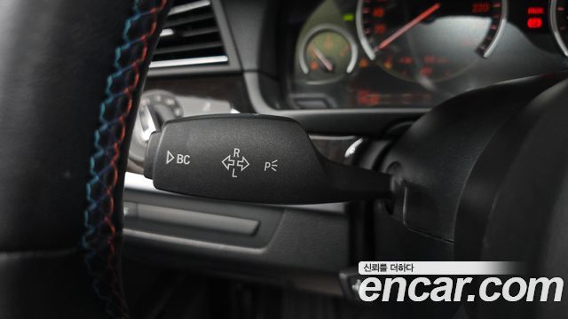 BMW 5-Series 2012 — photo 27
