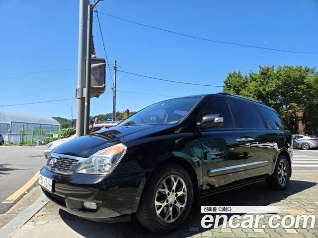 Kia Canival 2013 — photo 1