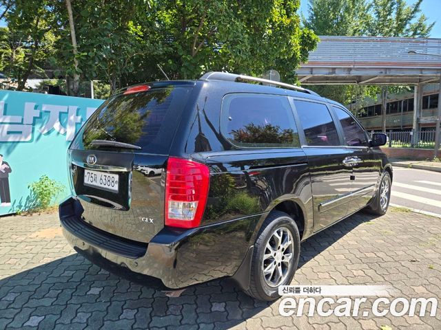 Kia Canival 2013 — photo 2