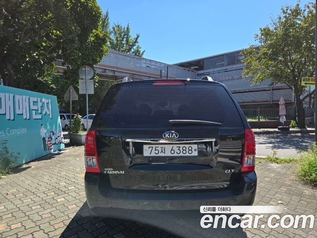 Kia Canival 2013 — photo 4
