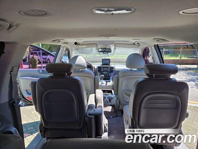 Kia Canival 2013 — photo 9