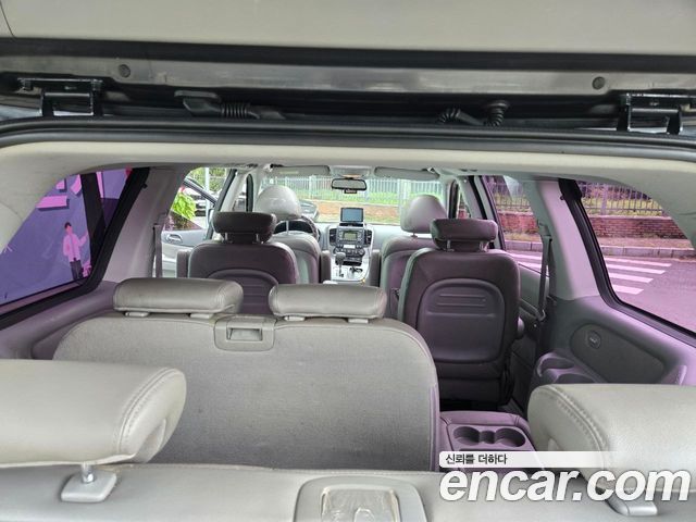 Kia Canival 2013 — photo 10