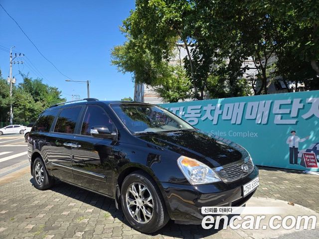 Kia Canival 2013 — photo 19