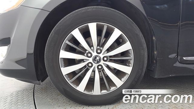 Kia K7 2012 — photo 5