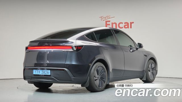 Tesla Model Y 2025 — photo 2