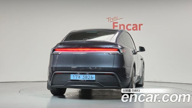 Tesla Model Y 2025 — photo 4