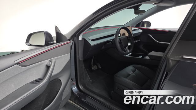 Tesla Model Y 2025 — photo 13