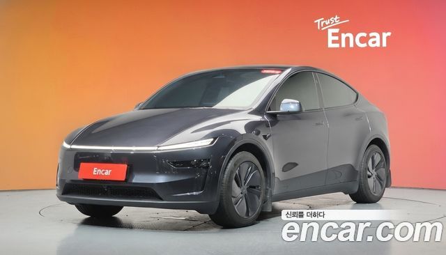 Tesla Model Y 2025 — photo 1