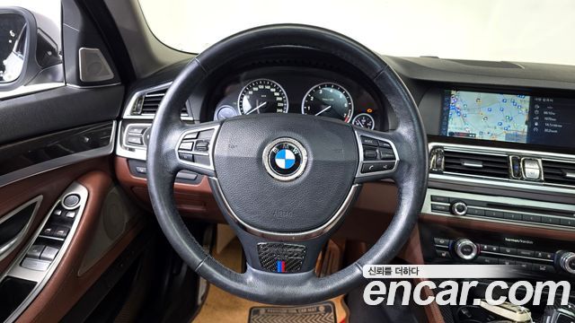 BMW 5-Series 2013 — photo 19