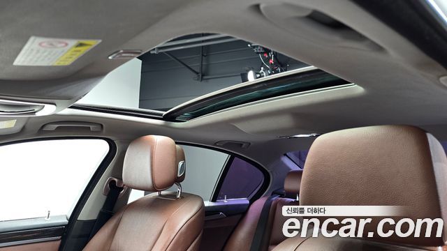 BMW 5-Series 2013 — photo 23