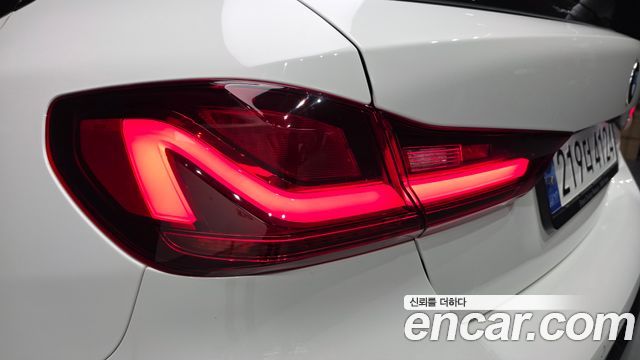 BMW 1-Series 2023 — photo 9