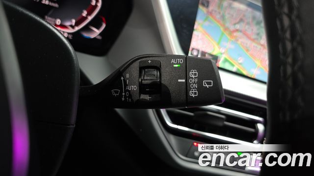 BMW 1-Series 2023 — photo 30