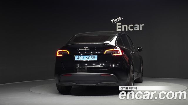 Tesla Model Y 2024 — photo 4