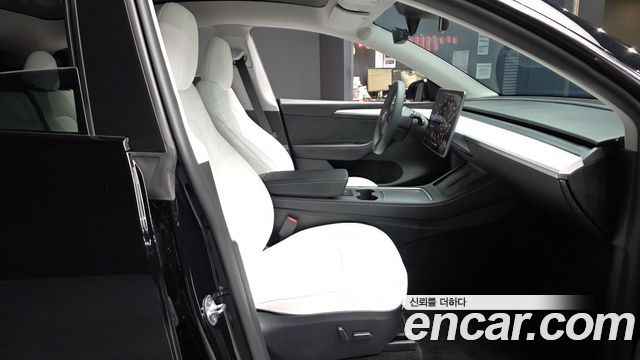 Tesla Model Y 2024 — photo 17