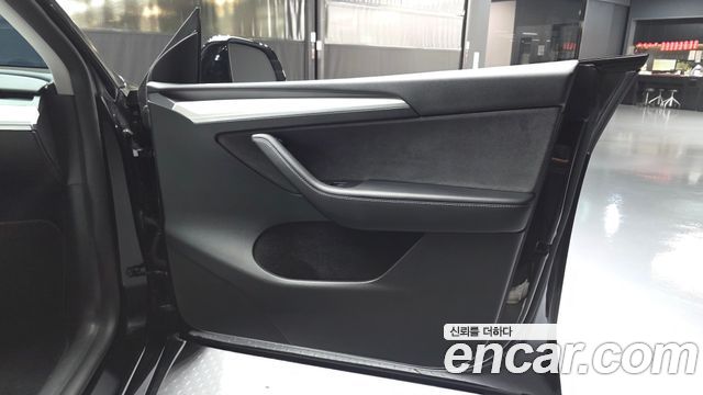Tesla Model Y 2024 — photo 14