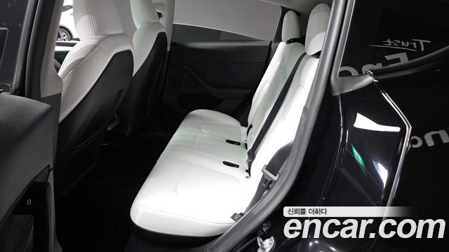 Tesla Model Y 2024 — photo 16