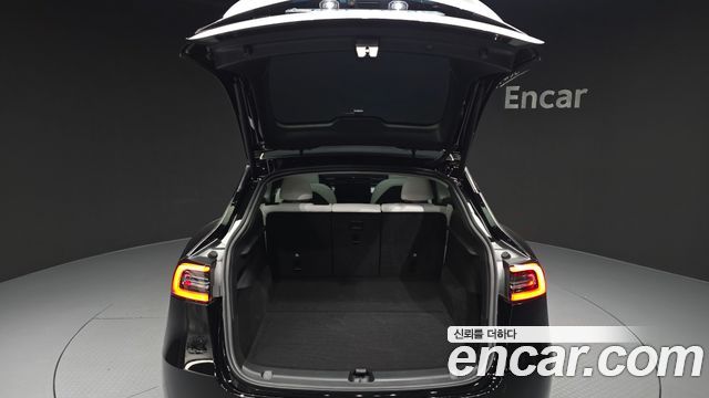 Tesla Model Y 2024 — photo 30