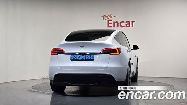 Tesla Model Y 2024 — photo 4
