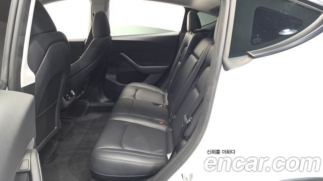 Tesla Model Y 2024 — photo 17