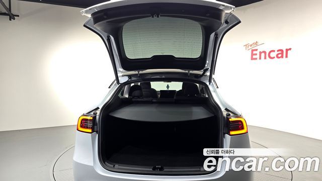 Tesla Model Y 2024 — photo 22