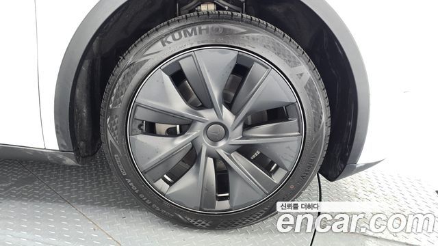 Tesla Model Y 2024 — photo 7