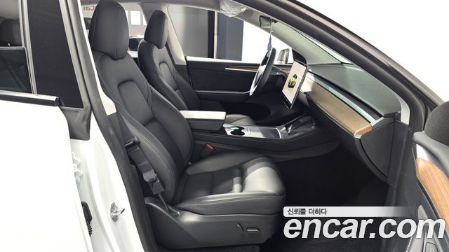 Tesla Model Y 2024 — photo 16