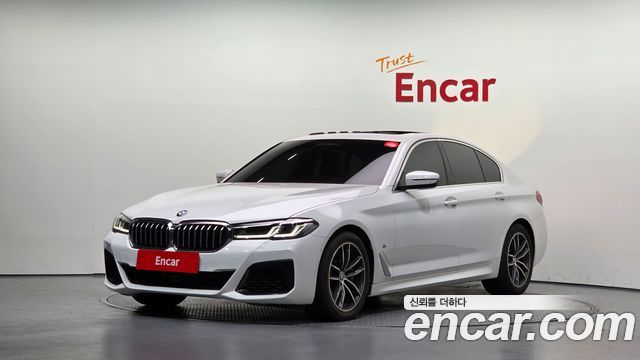 BMW 5-Series 2023 — photo 1