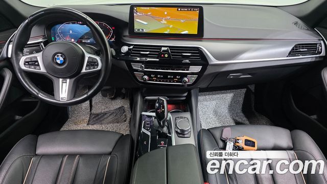 BMW 5-Series 2023 — photo 10