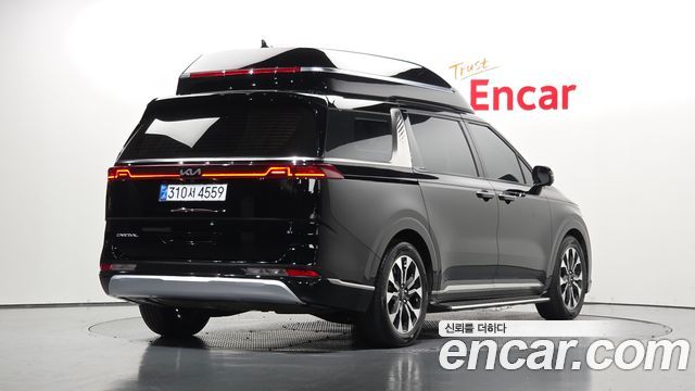 Kia Canival 2023 — photo 2