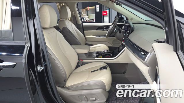 Kia Canival 2023 — photo 17