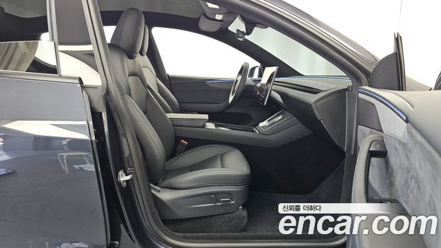 Tesla Model Y 2026 — photo 17