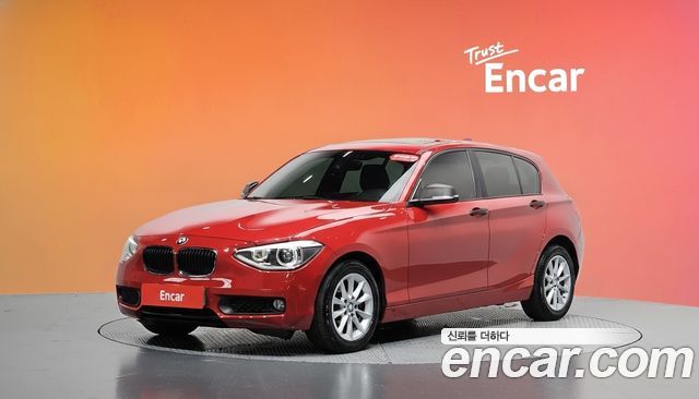 BMW 1-Series 2014 — photo 1