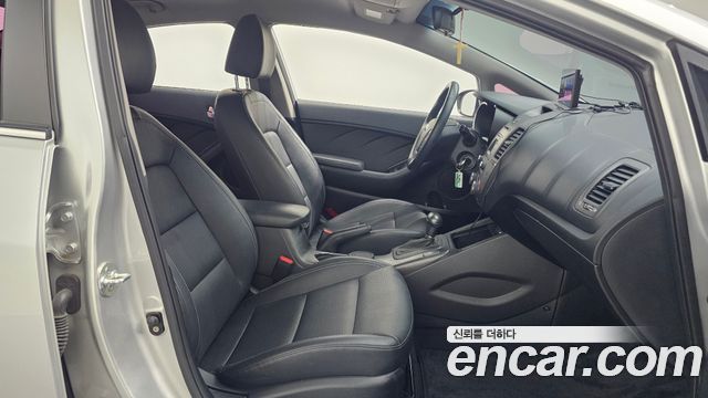Kia K3 2014 — photo 11