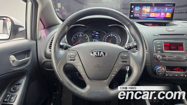 Kia K3 2014 — photo 13