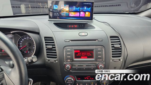 Kia K3 2014 — photo 14